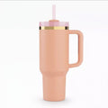 Stanley x Barbie Legends 80s Peaches N Cream FlowState Quencher 40oz pink and peach stainless steel tumbler with straw and handle
