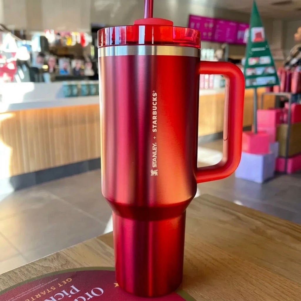 Red Stanley x Starbucks Quencher 40oz limited edition stainless steel tumbler with handle and straw
